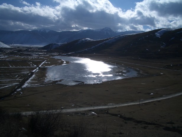 CIMG7105 Zhongdian, China: We rode our bikes on the winding mountain road. Breathing itself was challenging in the high altitude of 3,200 meters or 10,200 feet.