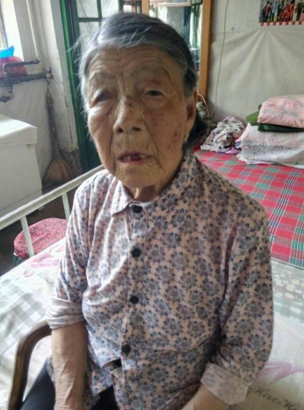 Survivor He Yuelian in her home in Shanxi, China (taken in December 2017 by her daughter Cheng)